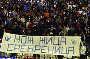 Serbian fans holding a banner that reads "Knife, Wire, Srebrenica" at the 2005 Bosnia Serbia World Cup qualifying match